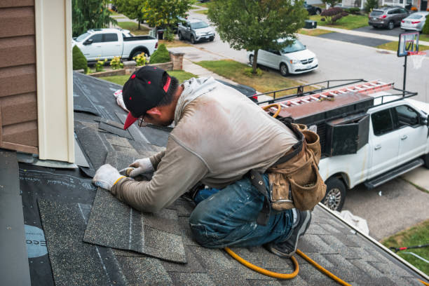 Professional Roofing technician working in Janesville, CA